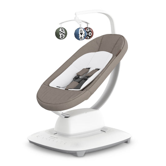 Dark taupe melange MamaRoo multi-motion baby swing by UPPAbaby with white base, patterned mobile, and textured fabric seat, side view