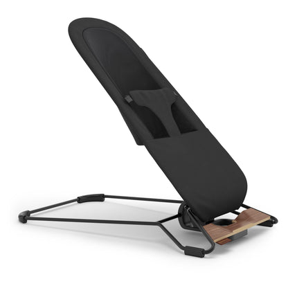 Black UPPAbaby baby bouncer with wood accent base