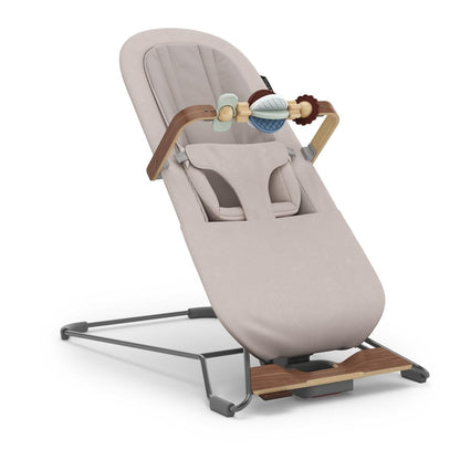 Uppababy Mira bouncer in beige with wooden toy bar