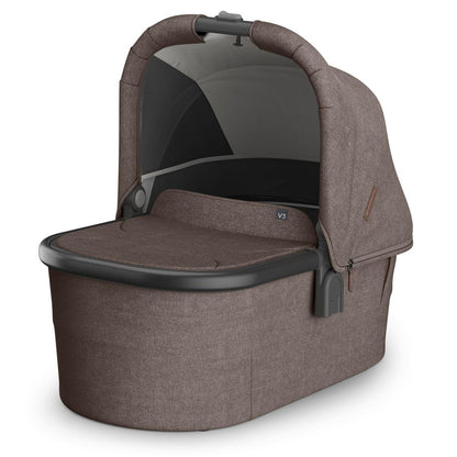 Mocha Melange fabric bassinet with carbon frame by UPPAbaby, V3 model, textured weave, side view, open canopy with mesh panel