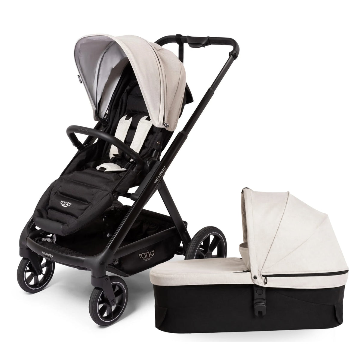 Valco Baby Ark stroller with black frame and beige canopy alongside a matching bassinet