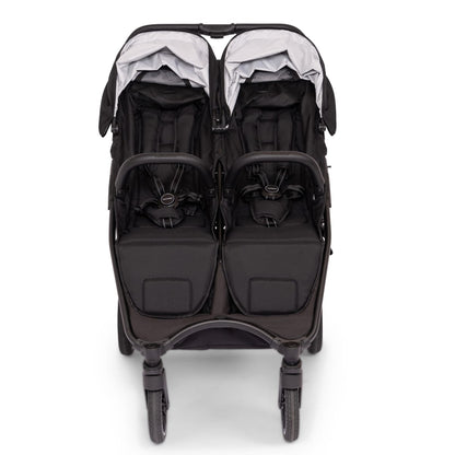 Valco double stroller with black seats and grey canopies