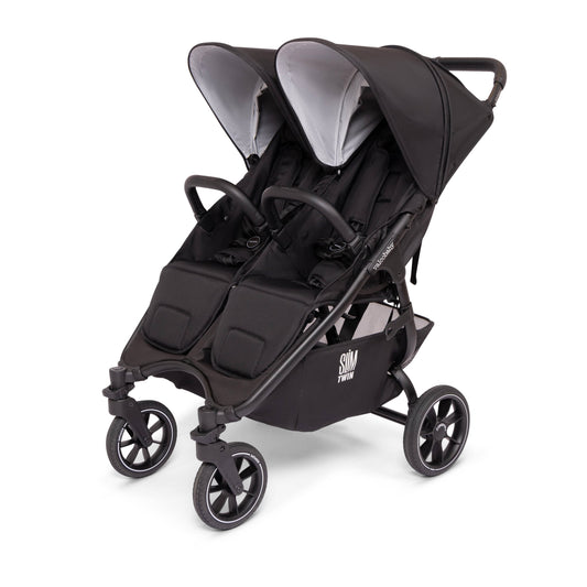 Valco Baby Slim Twin double stroller in black with dual canopies and storage basket