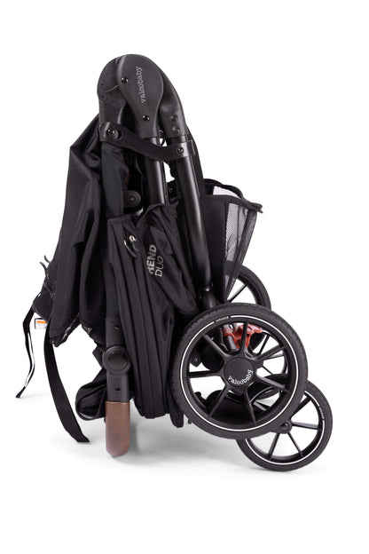 Folded black Valco Baby Trend Duo stroller
