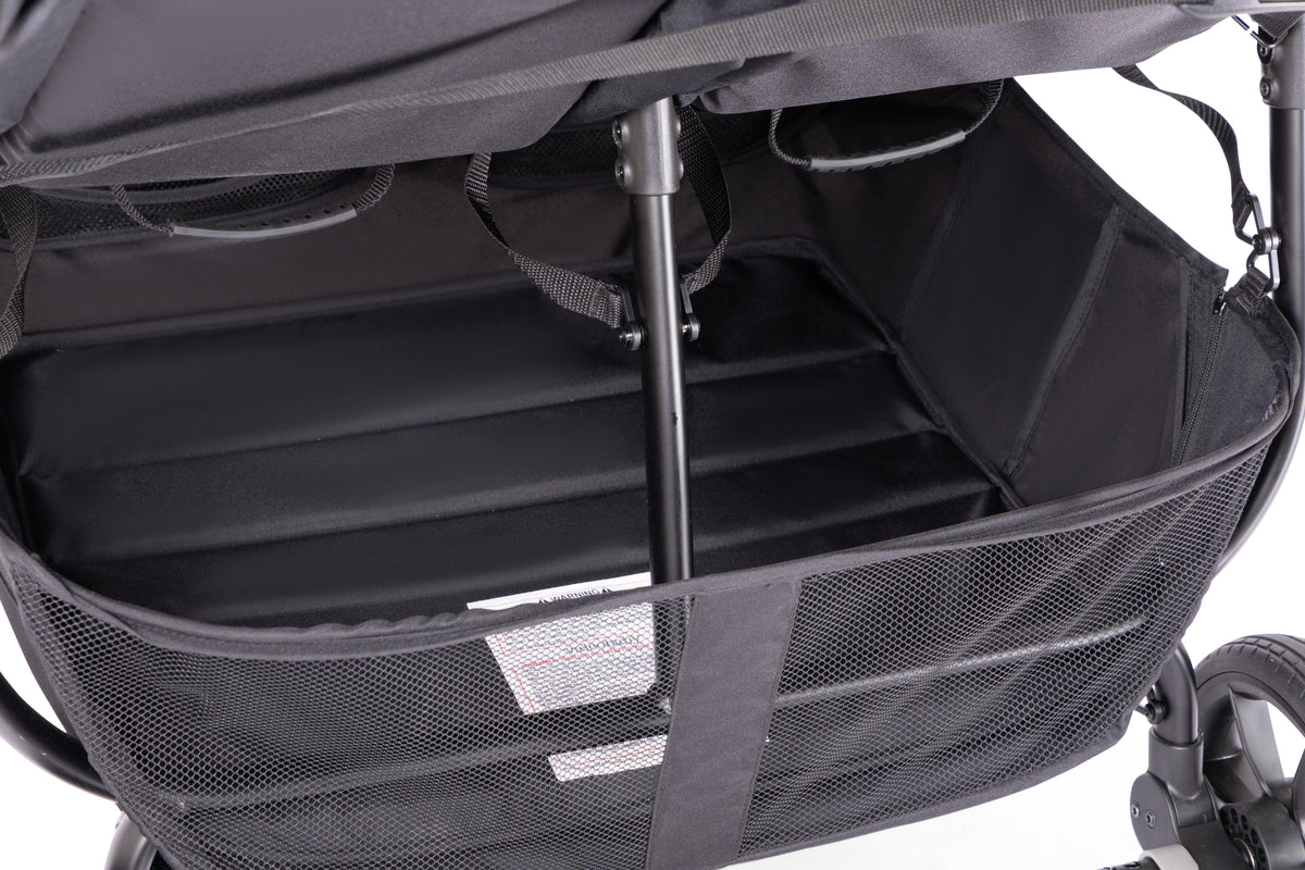 Black Valco stroller storage basket with mesh sides
