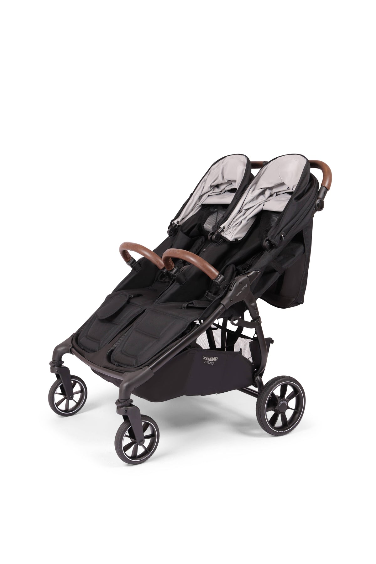 Valco Trend Duo double stroller in black with grey canopies and brown leatherette handles
