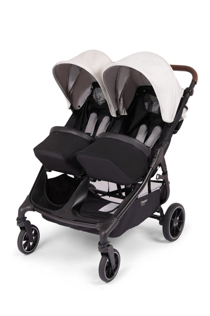 Valco Trend Duo double stroller with beige canopies and black seats