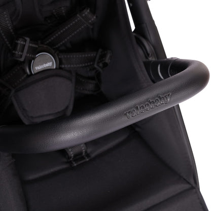 Black Valcobaby stroller bumper bar and five point harness