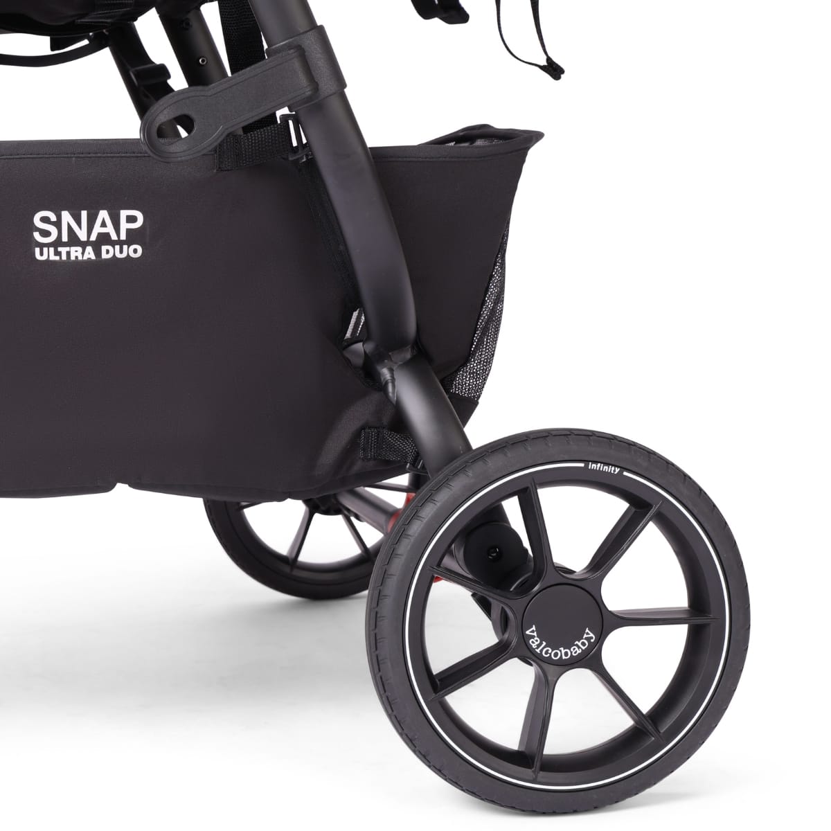 Valco Snap Ultra Duo stroller storage basket and black wheel