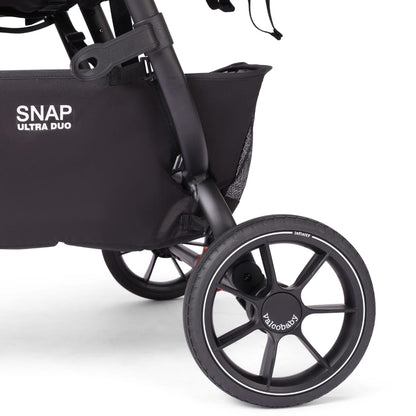 Valco Snap Ultra Duo stroller storage basket and black wheel