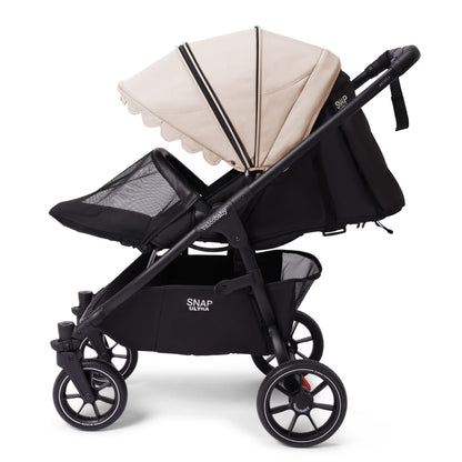 Valco Baby Snap Ultra stroller with black frame and beige canopy