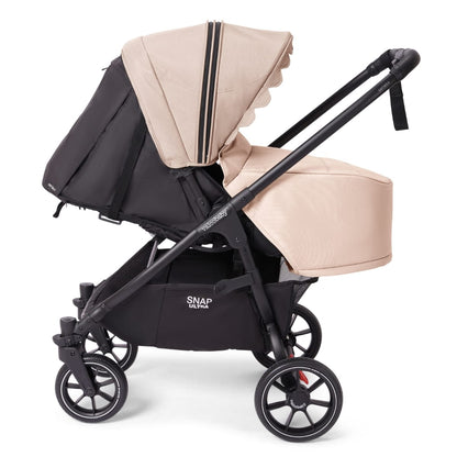 Valco Baby Snap Ultra stroller with black frame and beige seat and canopy