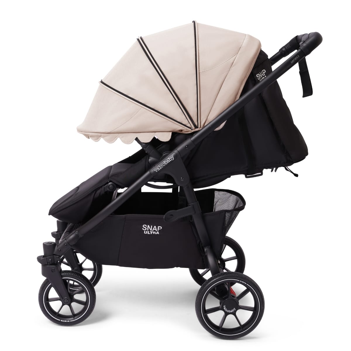 Valco Baby Snap Ultra stroller with black frame and beige canopy