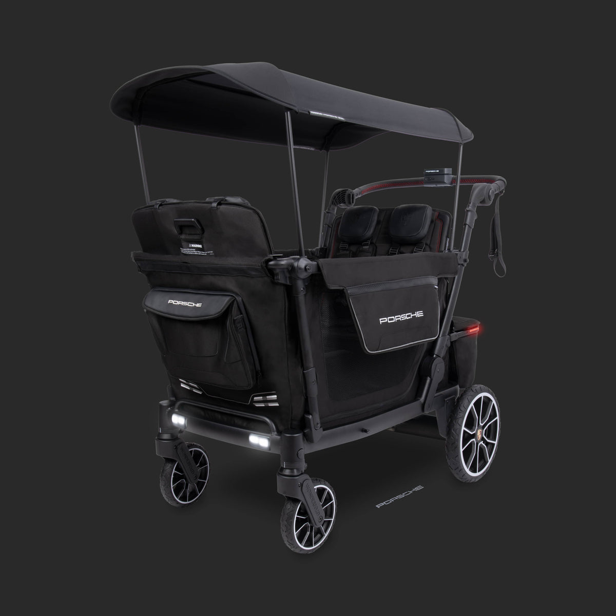 WonderFold Porsche edition black stroller wagon with canopy and branded storage bags